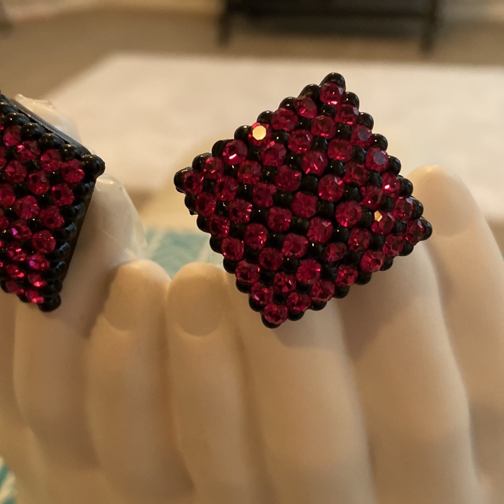 Fuchsia rhinestone post earrings.